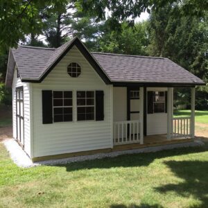white-chalet-with-porch-shed